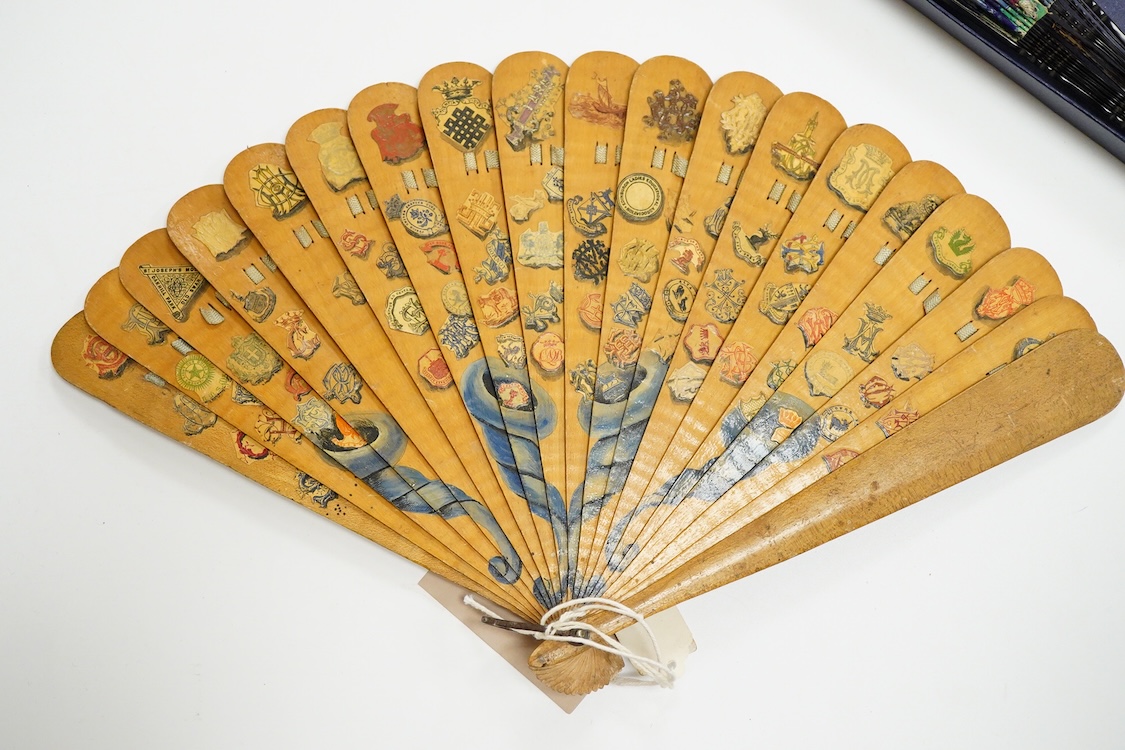 An unusual 19th century Chinese export gilt-decorated tortoiseshell and painted leaf fan, two English fans decorated with paper printed paper crests and a single sided Canton fan leaf lacking sticks, largest 23cm in leng